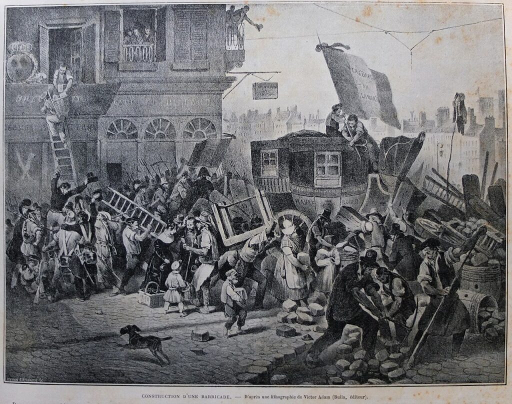 Construcció d'una barricada a París el 28 de juliol de 1830. Les «Trois Glorieuses» són la primera onada revolucionària liberal del segle XIX.